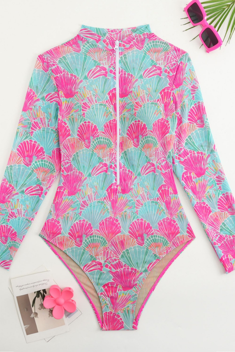 Traje de baño de una pieza con cremallera frontal impresa de concha y mangas largas para surf